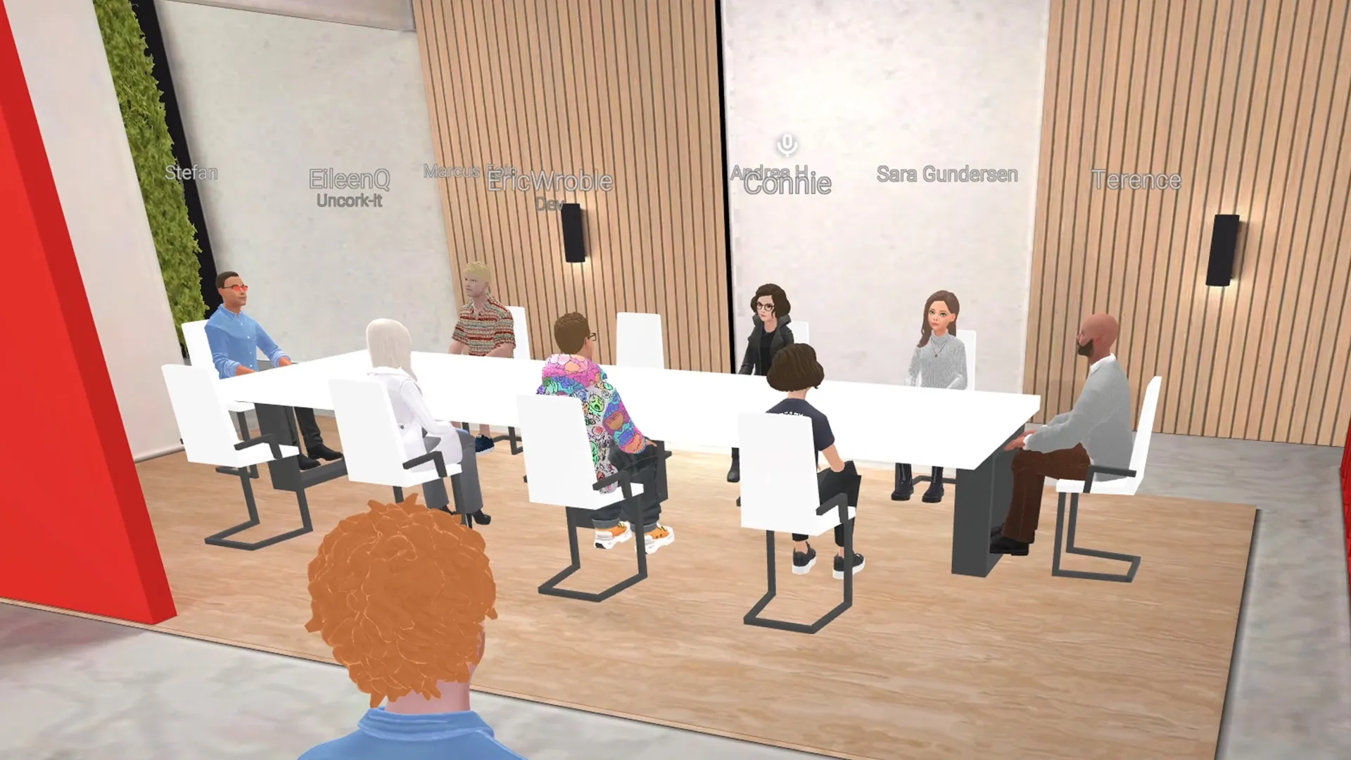 An image showing several avatars around a conference table